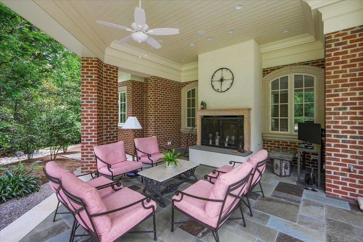 3300 Avon Road Durham, NC 27707 - Photo 49 of 67 a outdoor space with patio fireplace and a couch