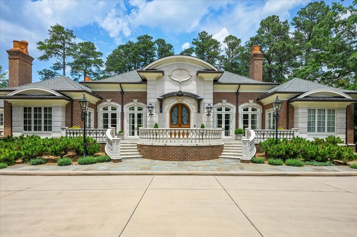 3300 Avon Road Durham, NC 27707 - Photo 58 of 67 a front view of a house with a garden