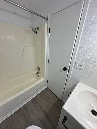 a bathroom with a sink and a tub