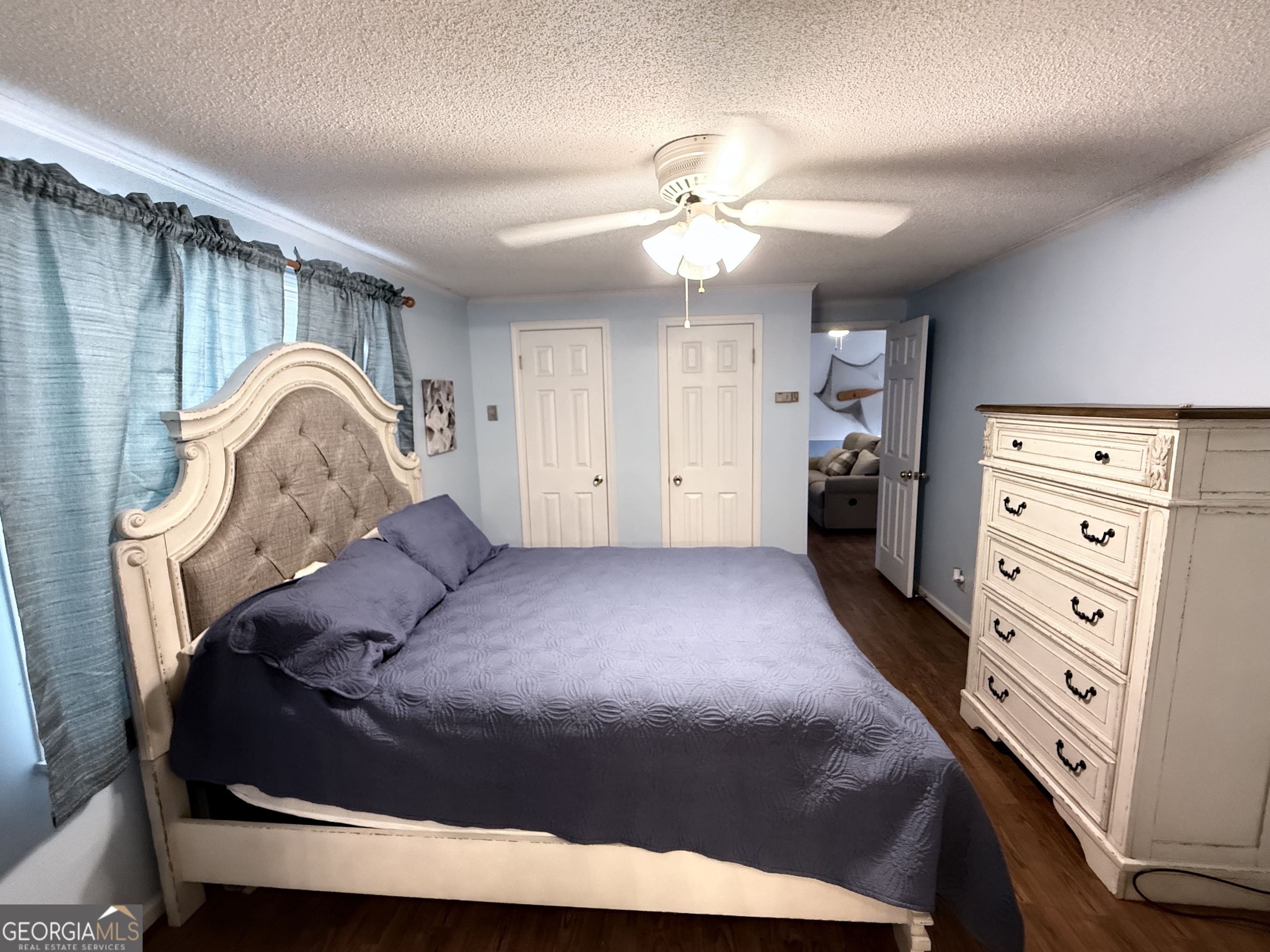 931 Shelor Ferry Road Fair Play, SC 29643 - Photo 11 of 26 a bedroom with a bed and a dresser