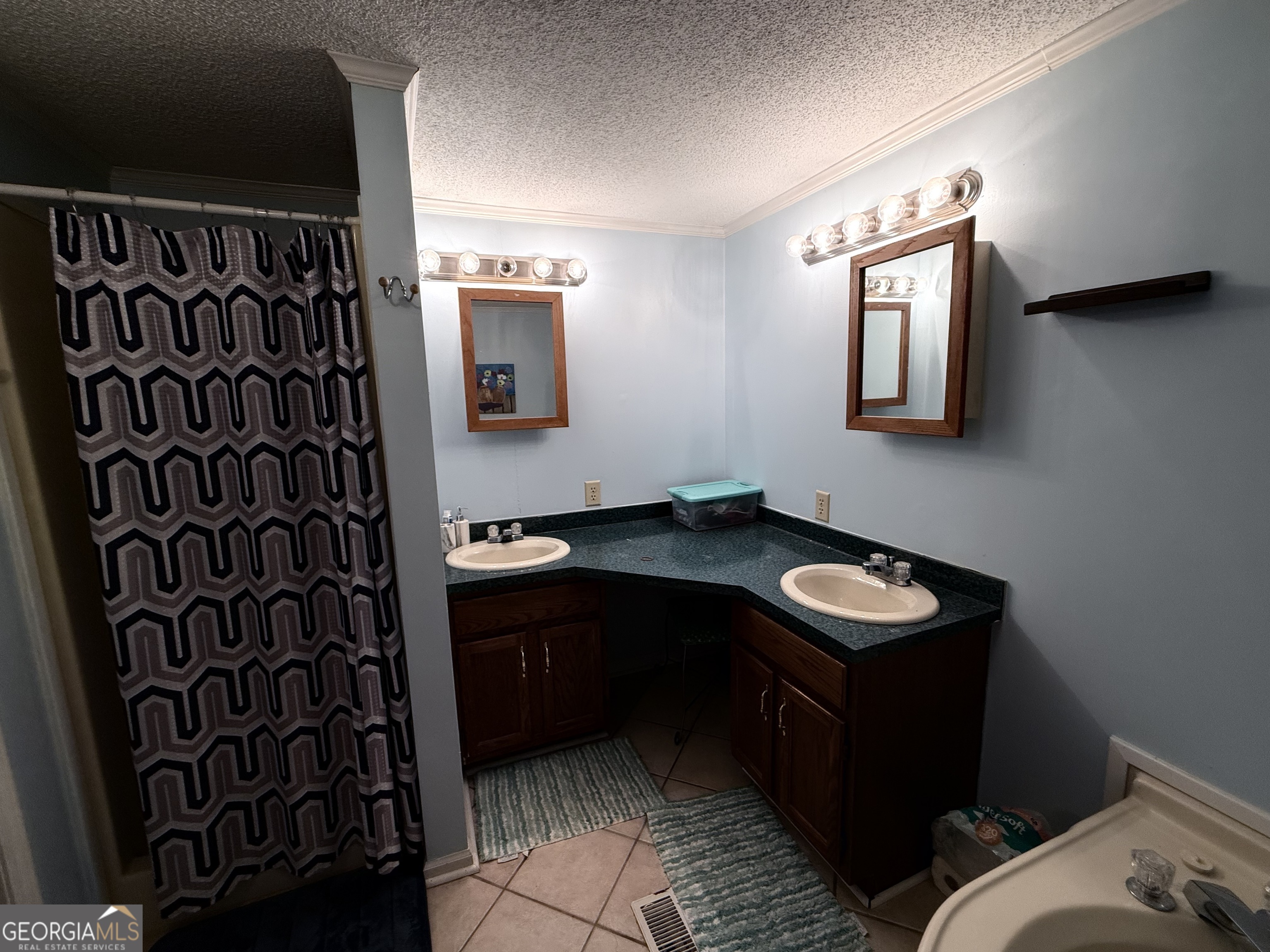 931 Shelor Ferry Road Fair Play, SC 29643 - Photo 14 of 26 a bathroom with a sink and a mirror