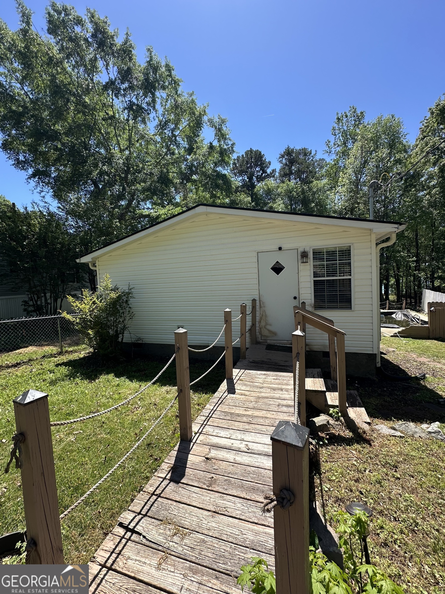 931 Shelor Ferry Road Fair Play, SC 29643 - Photo 2 of 26 a view of a house with backyard and sitting area