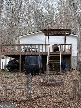 a front view of a house with parking space