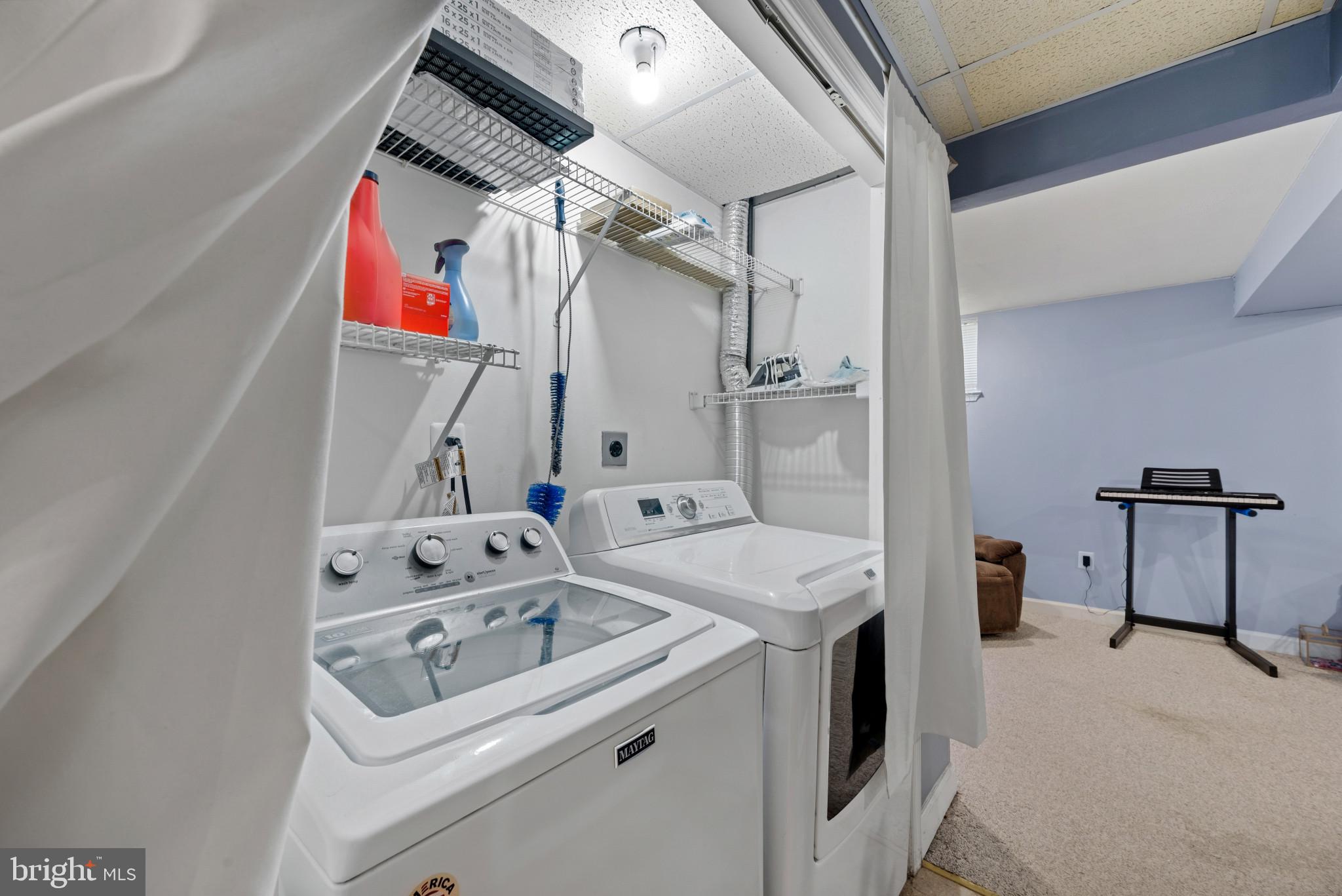 6330 Hanover Crossing Way Hanover, MD 21076 - Photo 24 of 32 a utility room with dryer and washer