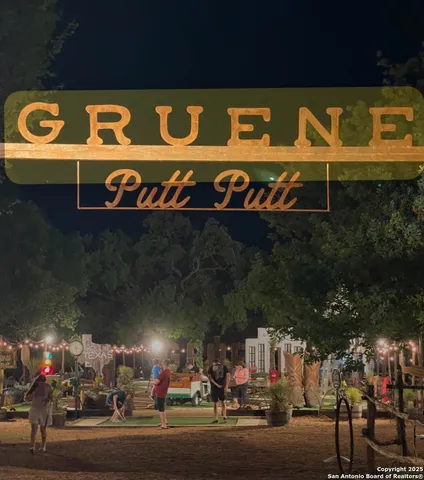 a view of a chairs and tables in the balcony