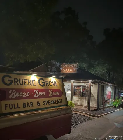 a group of people sitting on a street