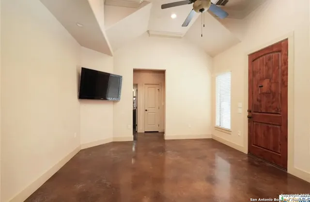 a view of a livingroom with a flat screen tv