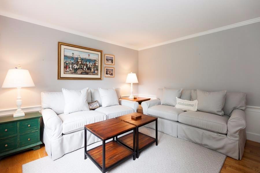 14 Bayview Road Osterville, MA 02655 - Photo 20 of 32 a living room with furniture and a lamp
