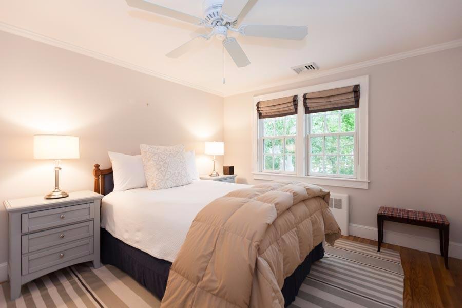14 Bayview Road Osterville, MA 02655 - Photo 27 of 32 a bedroom with a bed and a window