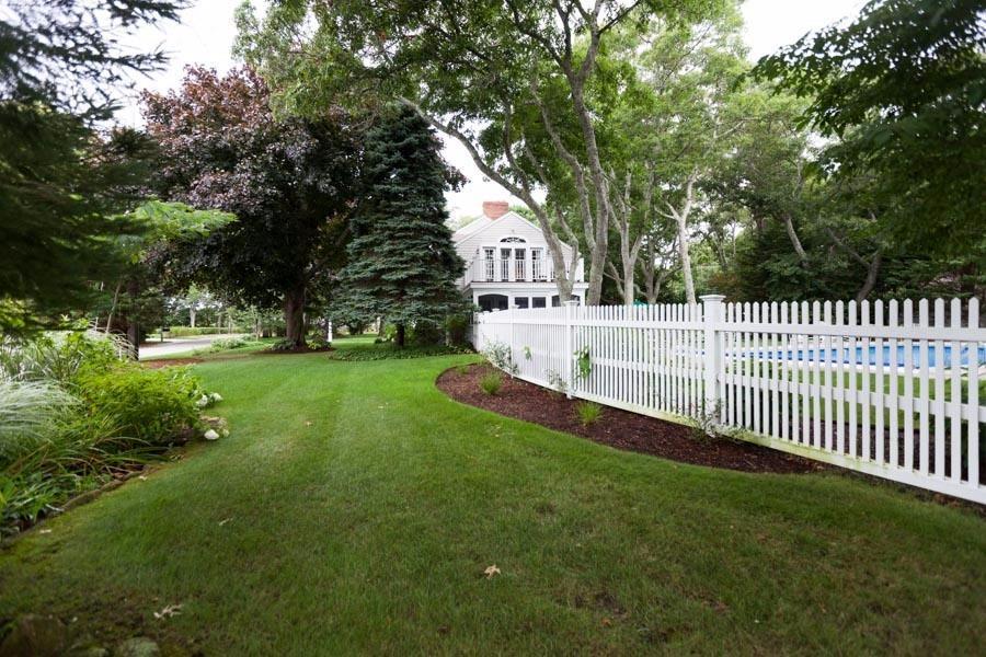 14 Bayview Road Osterville, MA 02655 - Photo 3 of 32 a view of a house with a yard and a tree
