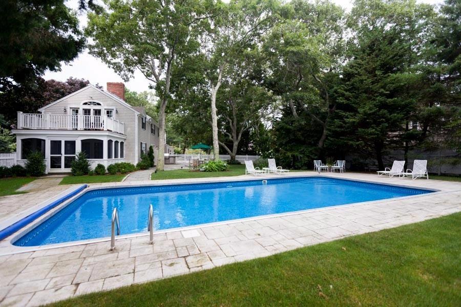 14 Bayview Road Osterville, MA 02655 - Photo 6 of 32 a view of an house with swimming pool and sitting area