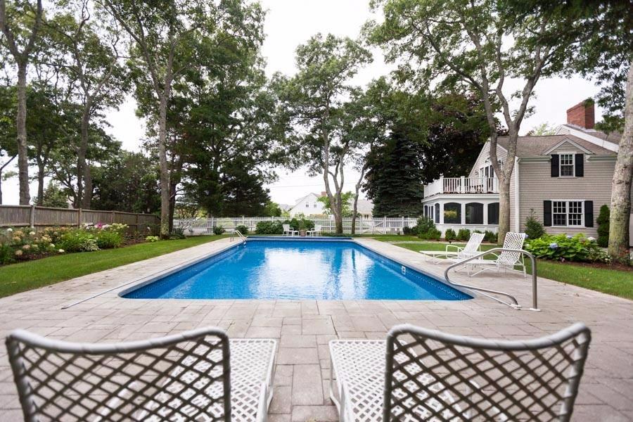 14 Bayview Road Osterville, MA 02655 - Photo 8 of 32 a view of a house with swimming pool and yard