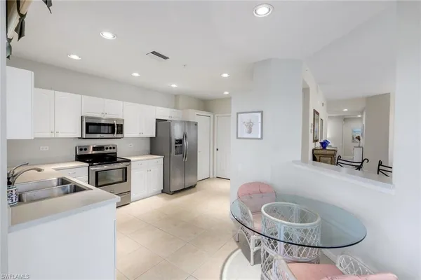 $395,000 | 8231 Parkstone Place, Unit 301, Naples, FL 34120