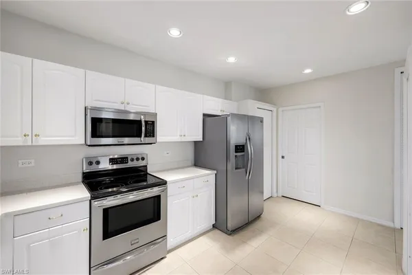 $395,000 | 8231 Parkstone Place, Unit 301, Naples, FL 34120