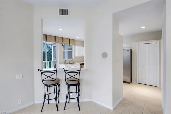 $395,000 | 8231 Parkstone Place, Unit 301, Naples, FL 34120