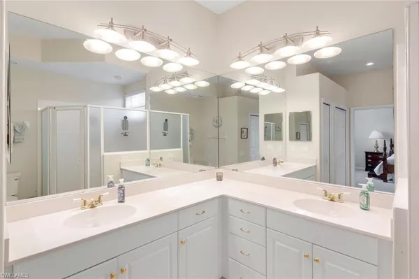 $395,000 | 8231 Parkstone Place, Unit 301, Naples, FL 34120