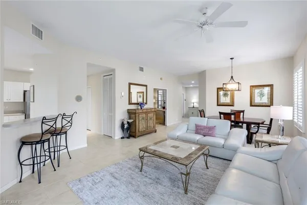 $395,000 | 8231 Parkstone Place, Unit 301, Naples, FL 34120
