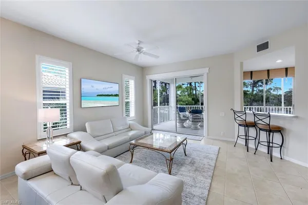 $395,000 | 8231 Parkstone Place, Unit 301, Naples, FL 34120