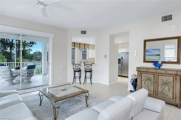 $395,000 | 8231 Parkstone Place, Unit 301, Naples, FL 34120