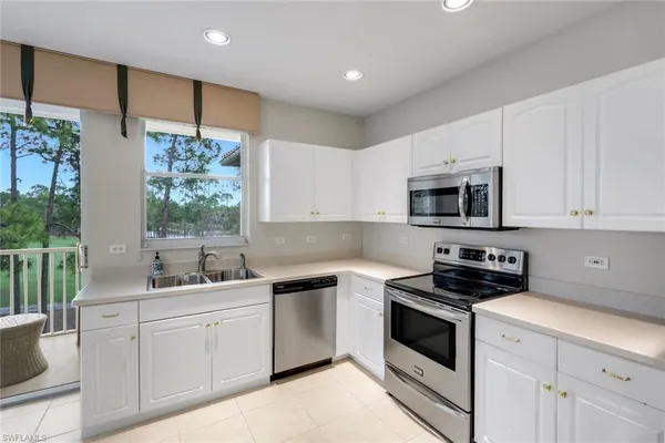 $395,000 | 8231 Parkstone Place, Unit 301, Naples, FL 34120