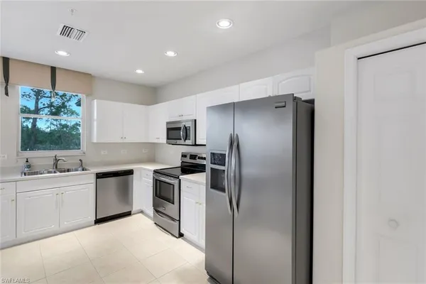 $395,000 | 8231 Parkstone Place, Unit 301, Naples, FL 34120