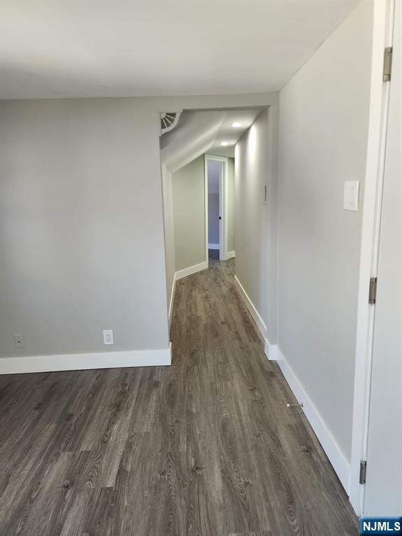 93 Hughes Street, Unit 5 Maplewood, NJ 07040 - Photo 3 of 14 a view of a hallway with wooden floor