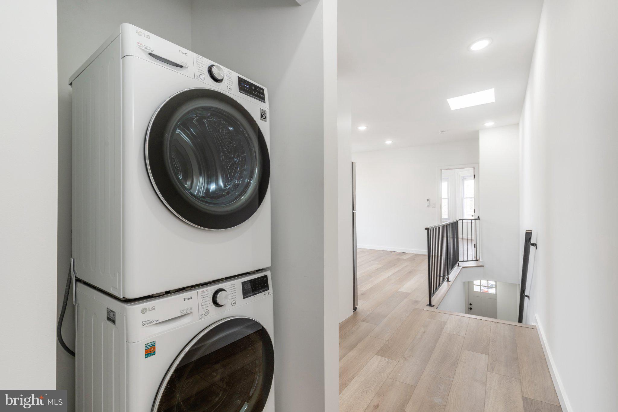 5758 Spruce Street, Unit 2 Philadelphia, PA 19139 - Photo 17 of 25 Modern laundry nook in bright space.