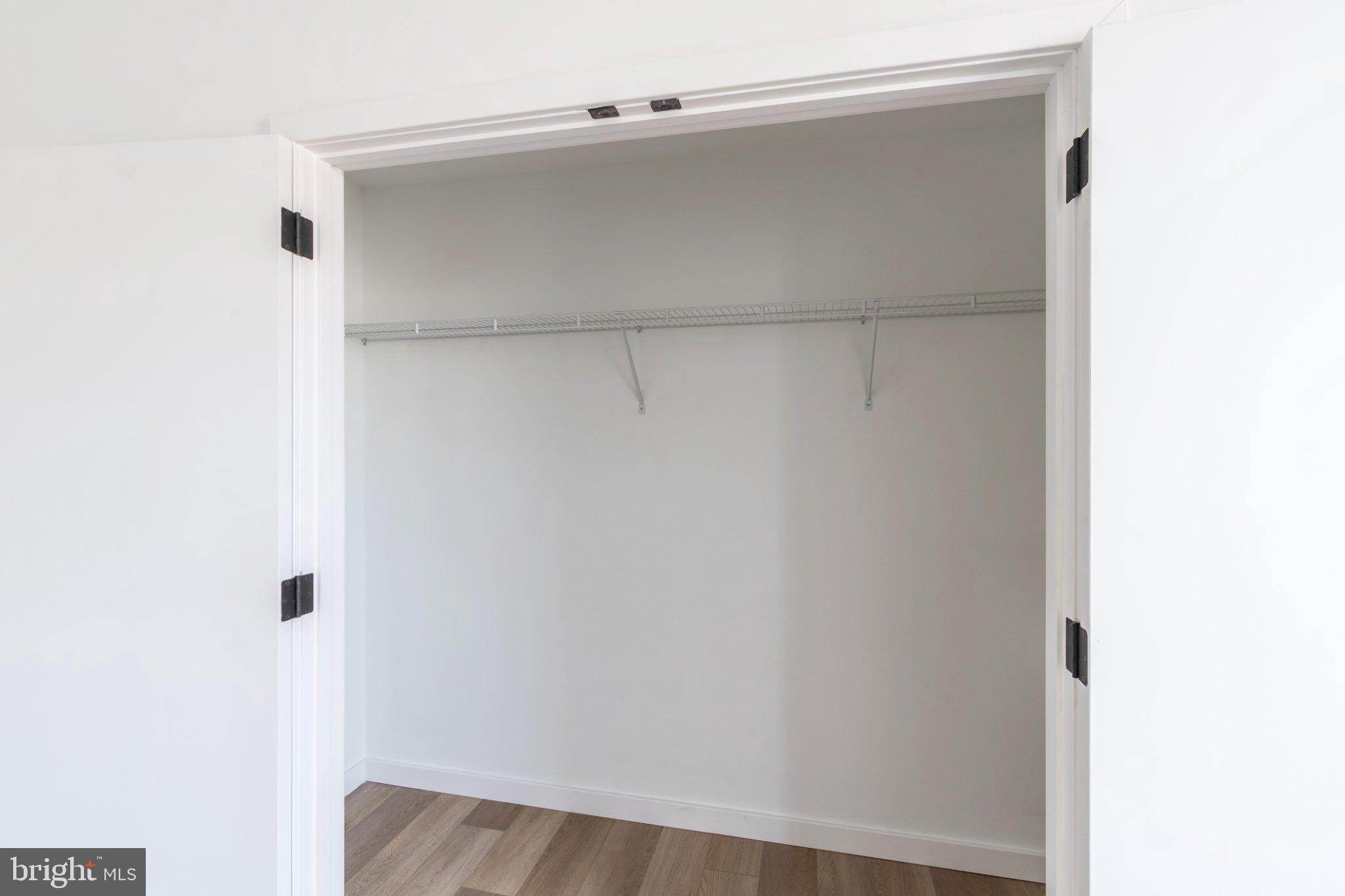 5758 Spruce Street, Unit 2 Philadelphia, PA 19139 - Photo 19 of 25 Spacious, minimalist closet design.