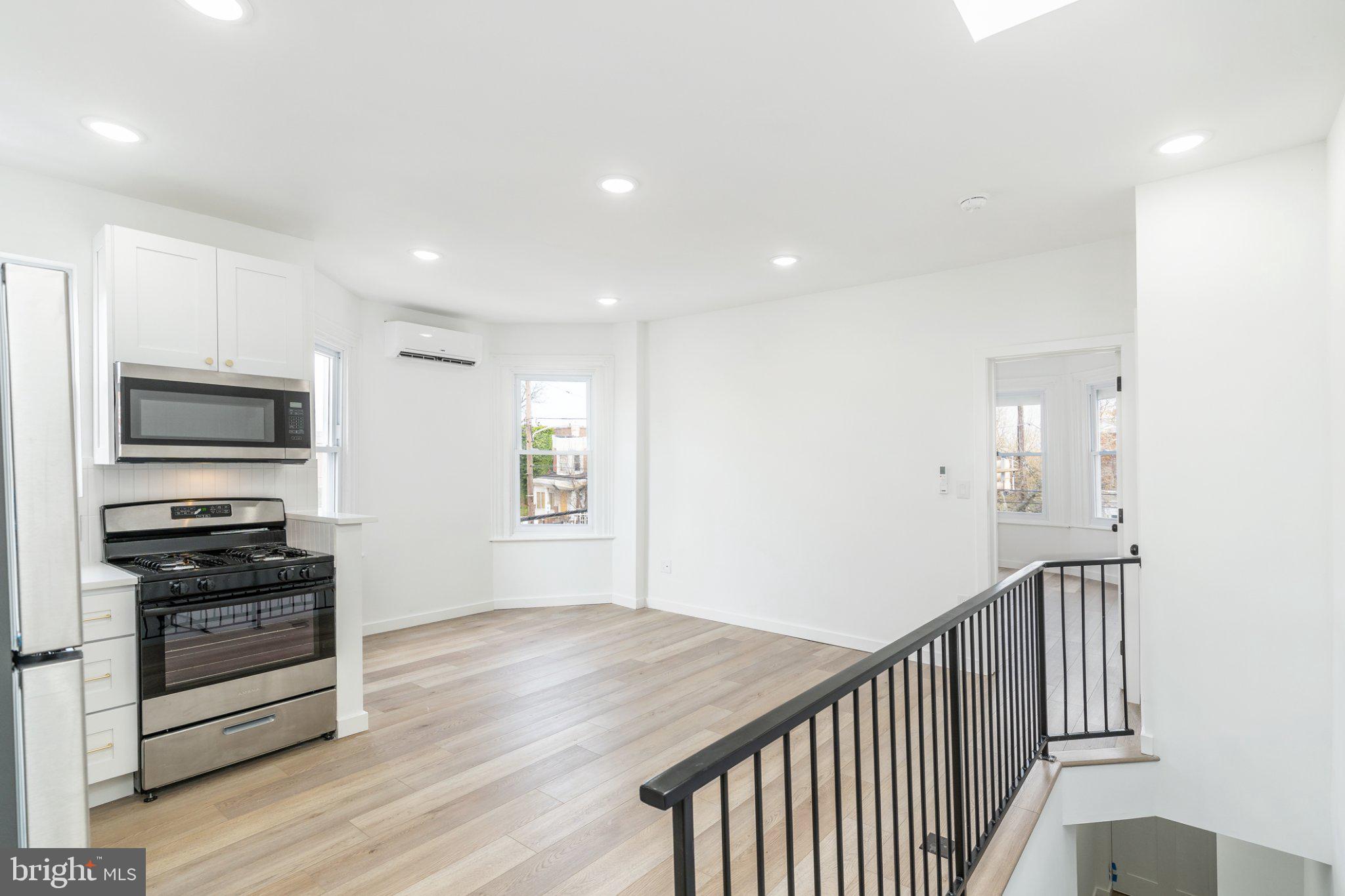 5758 Spruce Street, Unit 2 Philadelphia, PA 19139 - Photo 3 of 25 Bright and airy open-concept space.