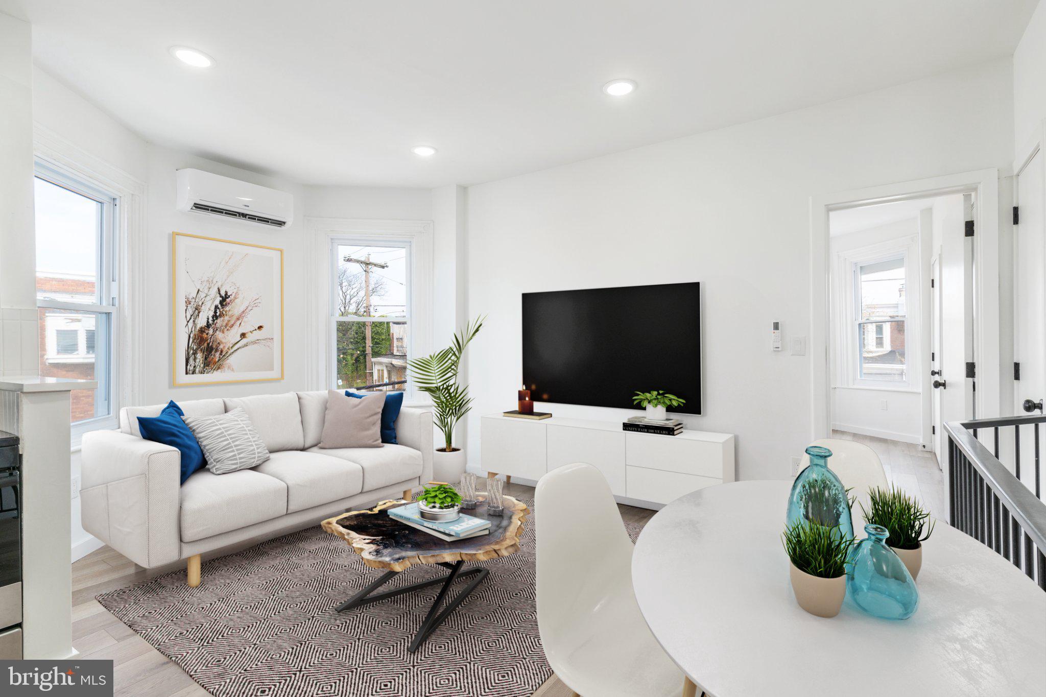 5758 Spruce Street, Unit 2 Philadelphia, PA 19139 - Photo 4 of 25 Bright and airy modern living space.