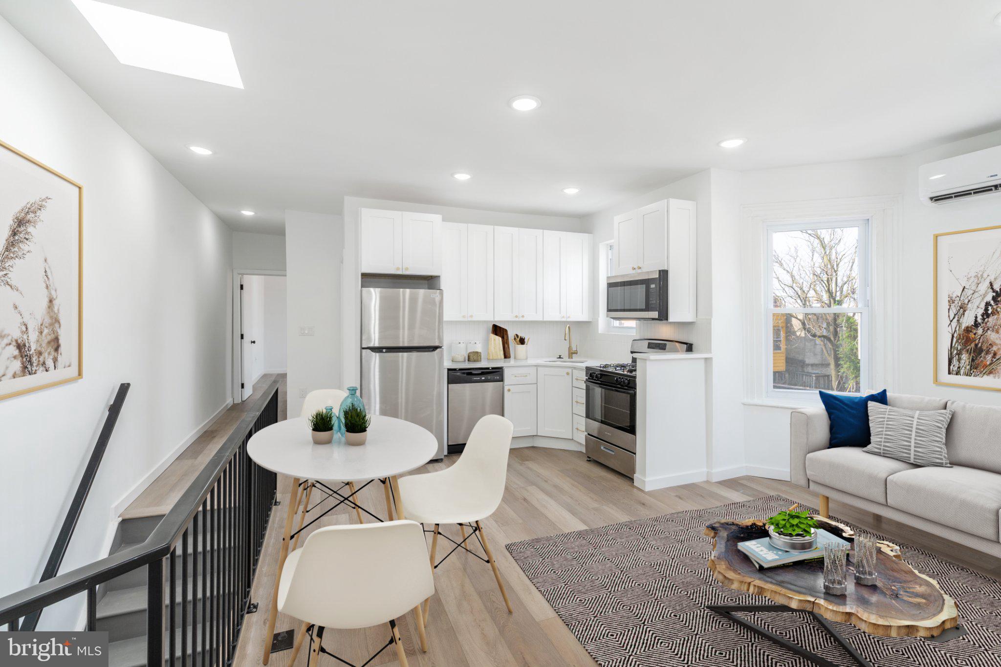 5758 Spruce Street, Unit 2 Philadelphia, PA 19139 - Photo 5 of 25 Bright and modern open living space.