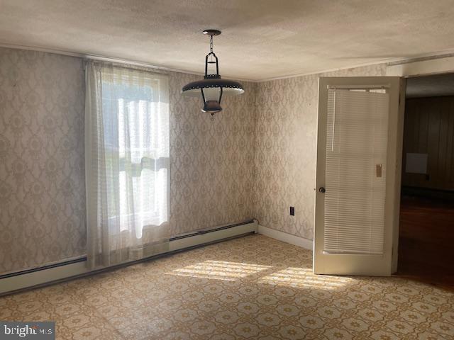 5733 Coventry Parish Road Westover, MD 21871 - Photo 13 of 27 a view of empty room with windows