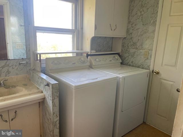 5733 Coventry Parish Road Westover, MD 21871 - Photo 18 of 27 a utility room with dryer and washer