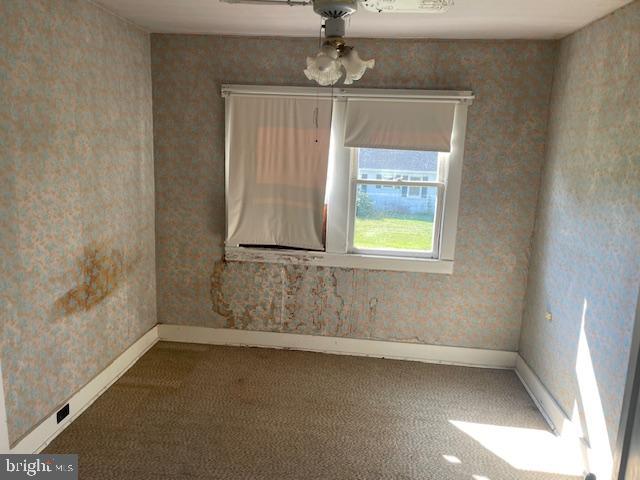 5733 Coventry Parish Road Westover, MD 21871 - Photo 21 of 27 an empty room with a window