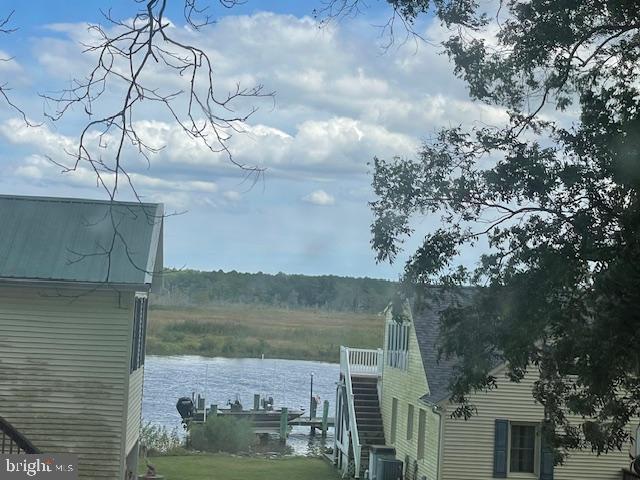 5733 Coventry Parish Road Westover, MD 21871 - Photo 23 of 27 a view of a lake in between two chairs
