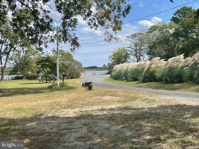 5733 Coventry Parish Road Westover, MD 21871 - Photo 25 of 27 a view of a yard with an outdoor space