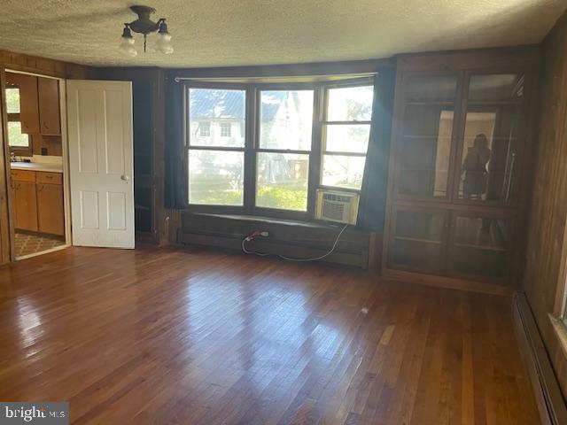 5733 Coventry Parish Road Westover, MD 21871 - Photo 9 of 27 an empty room with wooden floor and windows