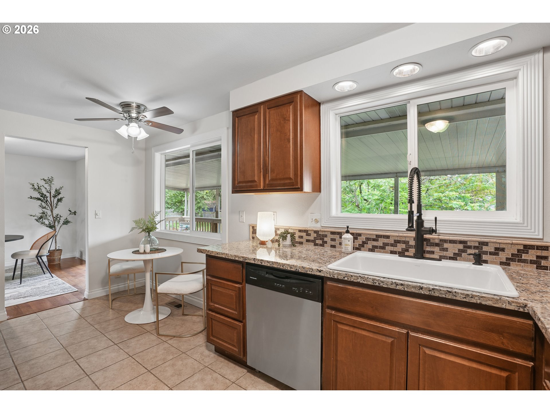 992 South South End Road Oregon City, OR 97045 - Photo 11 of 38 a kitchen with a sink cabinets and window