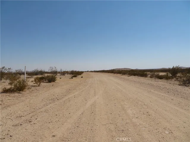 a view of wooden floor and a sink