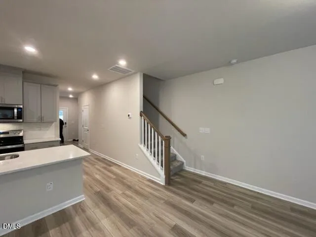 a bathroom with a sink and mirror