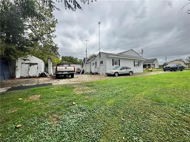 a cars parked in front of a house