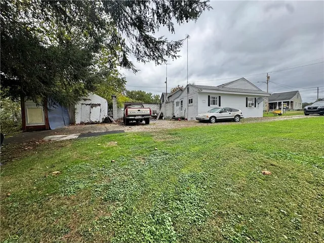 a view of a yard in front of a building
