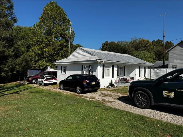 a house view with a garden space