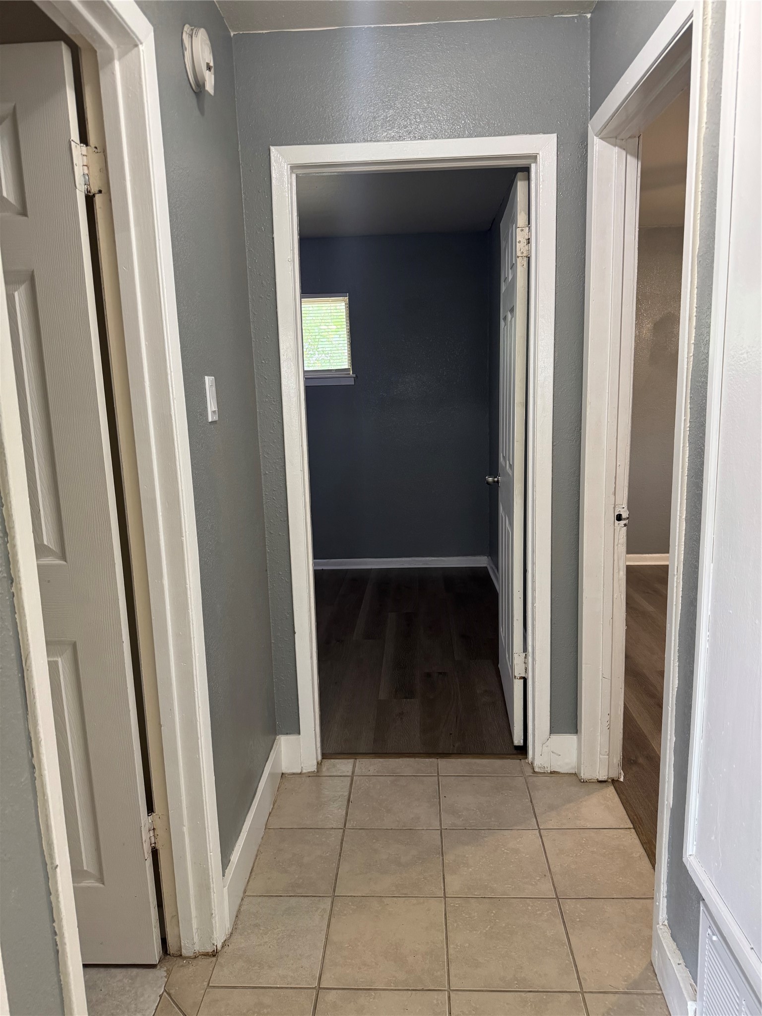 604 Wilson Road, Unit 5 Humble, TX 77338 - Photo 9 of 25 Hallway to 2 bedrooms and 1 bathroom