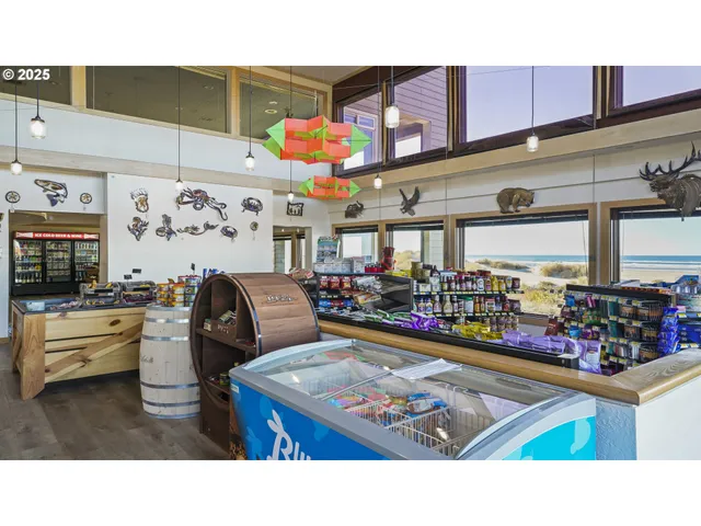 a living room with lots of furniture and black furniture