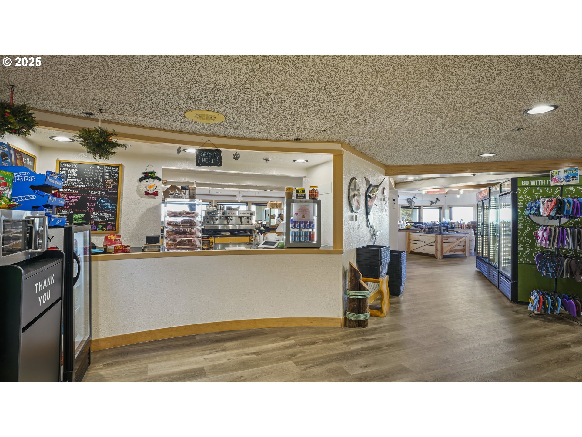 88416 1st Avenue, Unit 101 Florence, OR 97439 - Photo 18 of 24 a room with wooden floor