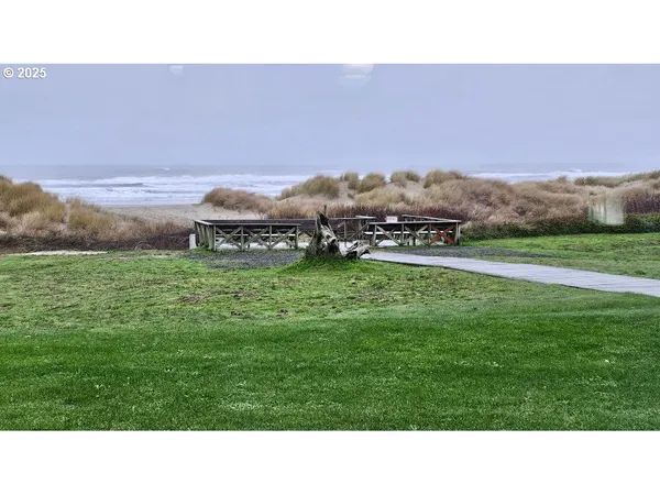 a black and white photo of a field