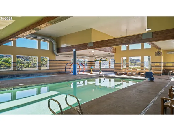 a kitchen with a table and chairs