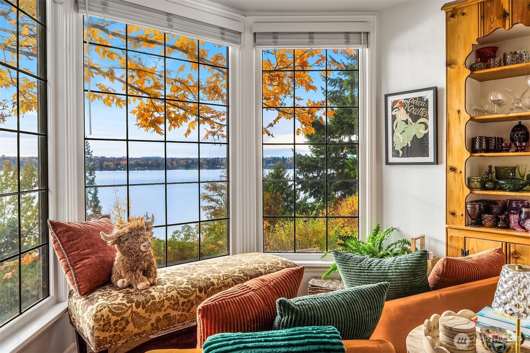 8025 West Mercer Way Mercer Island, WA 98040 - Photo 23 of 36 a bedroom with furniture and a large window