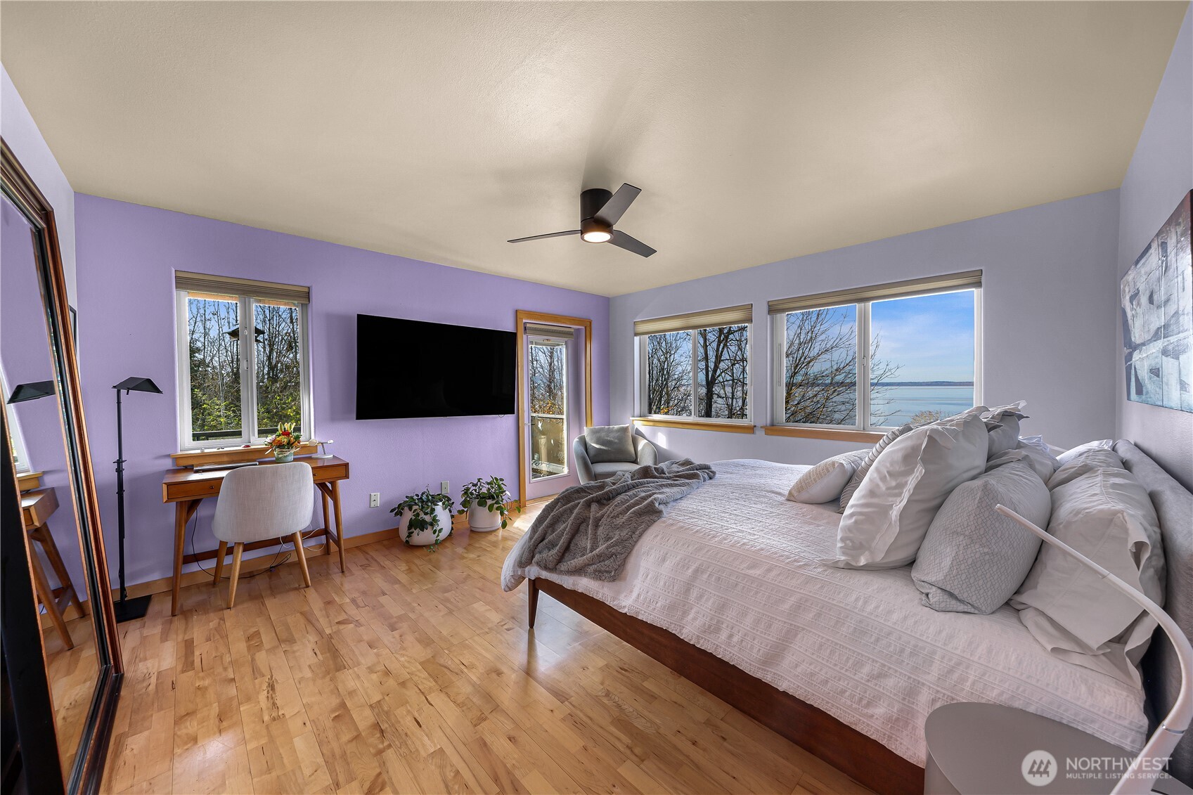 106 North State Street Bellingham, WA 98225 - Photo 12 of 34 a bedroom with a bed and a flat screen tv